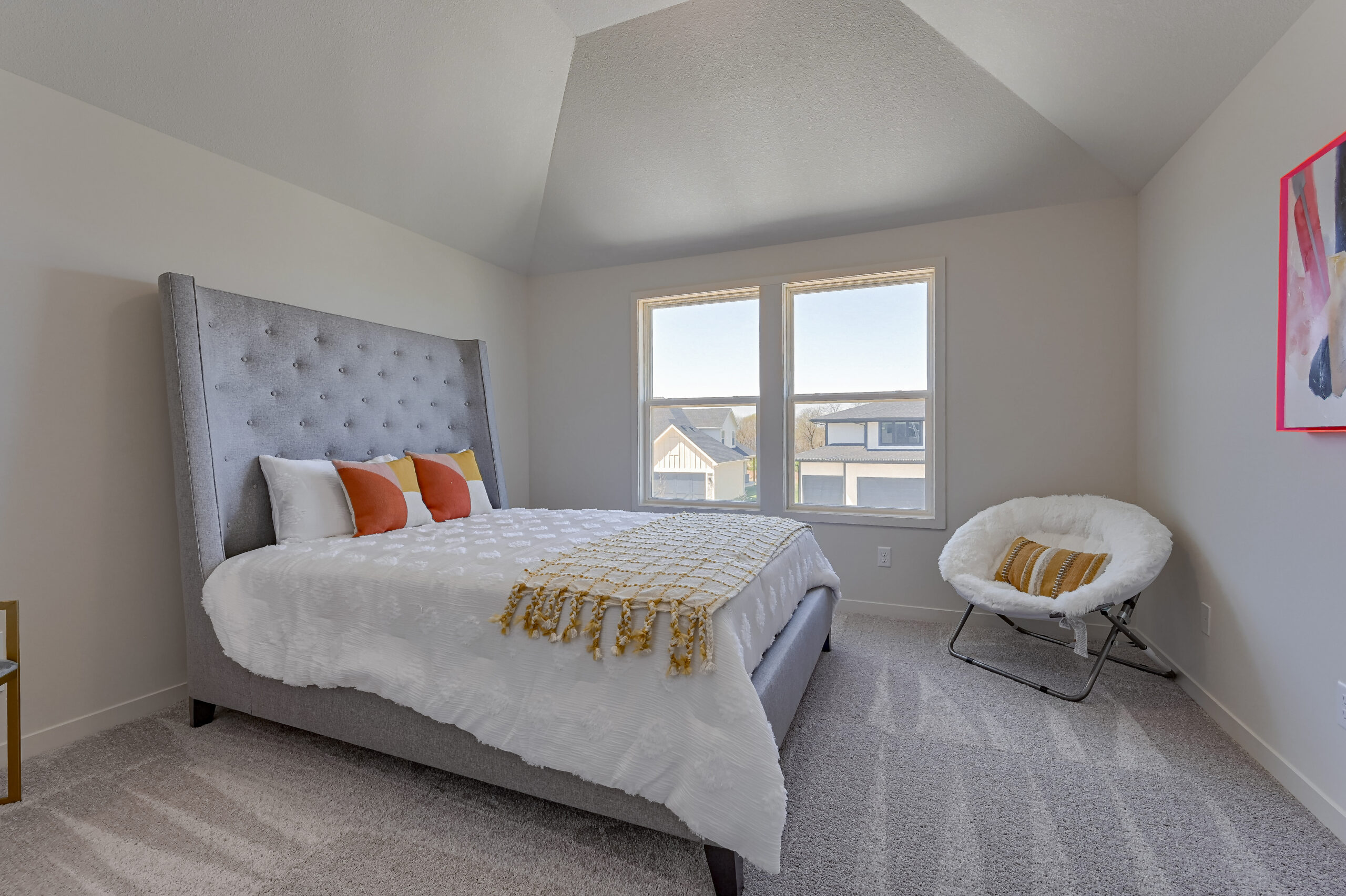 Irving - Secondary Bedroom #3 with grey bed and orange throw pillows